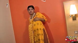 Chunky Indian women unclothes above webcam